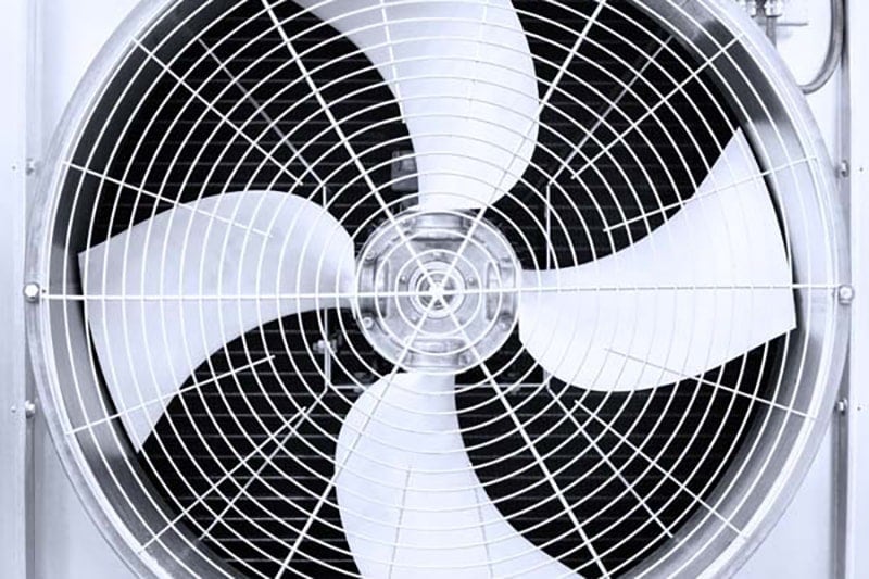 Close up image of an air conditioner fan showing the how it's important to know the components of your AC system.