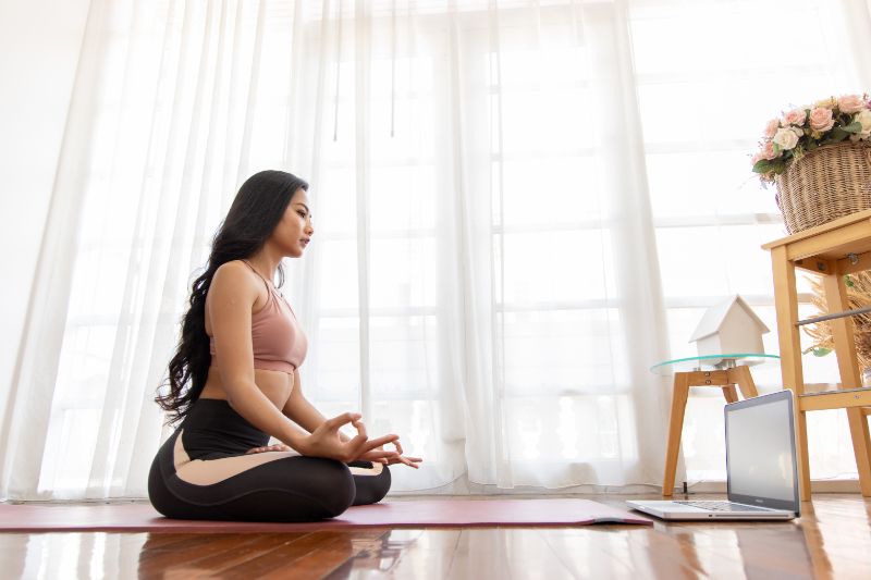 Image of someone doing yoga. Zone Your Way to Comfort.|